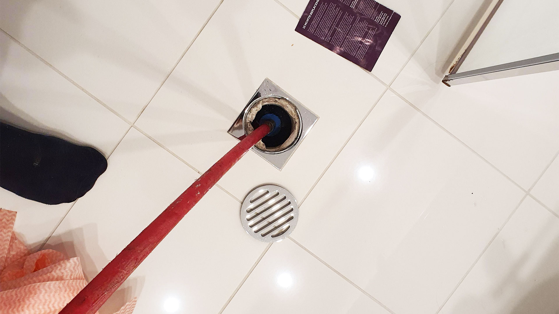 Cleaning a shower drain
